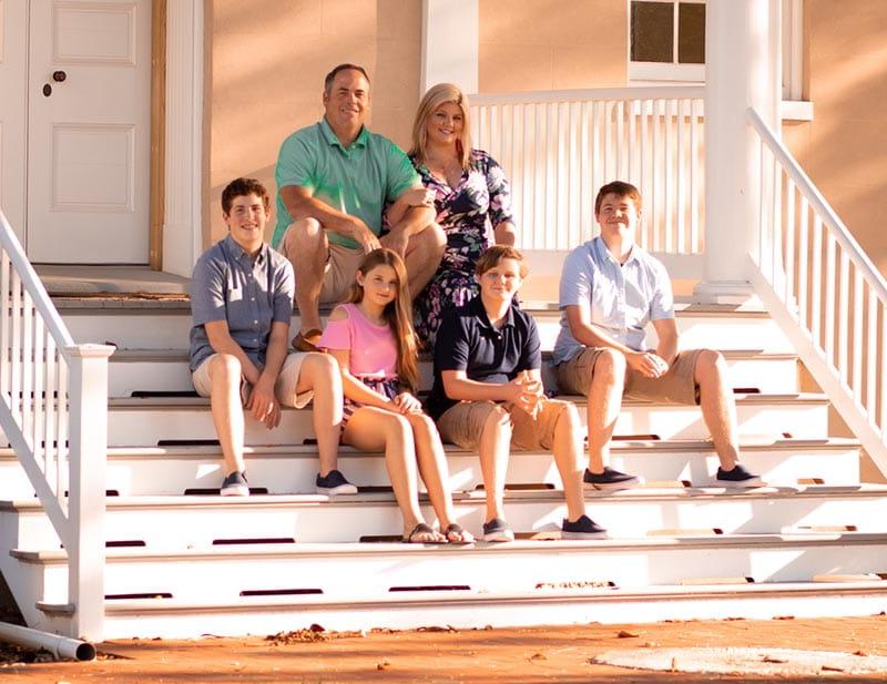 Katie Moegenberg with her family. Clockwise from top left: Katie, Matthew, Joseph, Emma, Griffin and Matthew. (Photo by Blair Davis Photography)